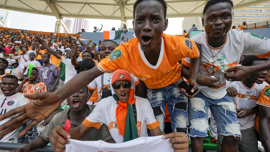 Jubilant fans take to streets to celebrate ivory coast s afcon victory
