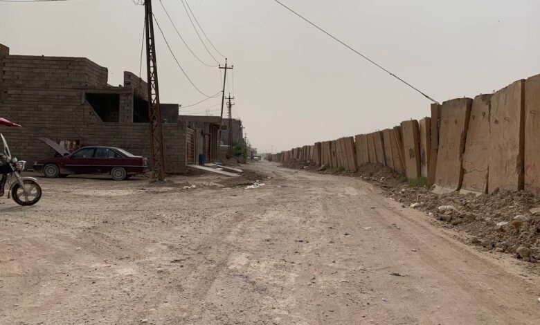 Years after civil war security wall holds back iraqi city