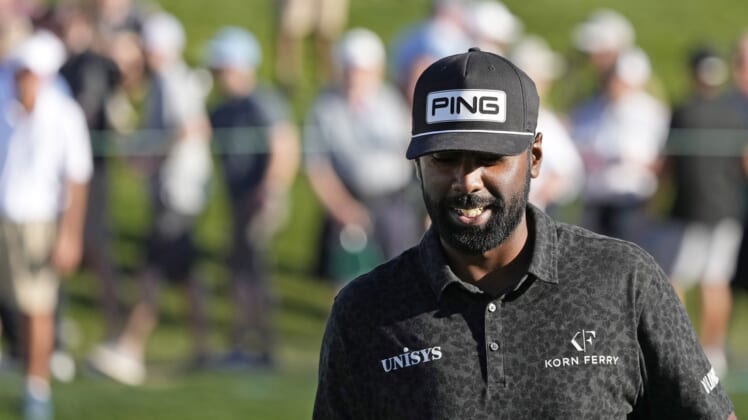 Theegala grabs early lead at rain hit pga phoenix open
