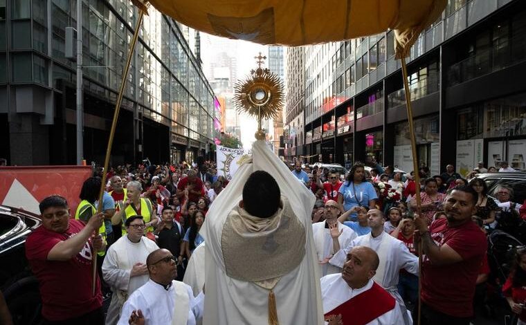 Philippine catholics swarm christ icon in feverish parade