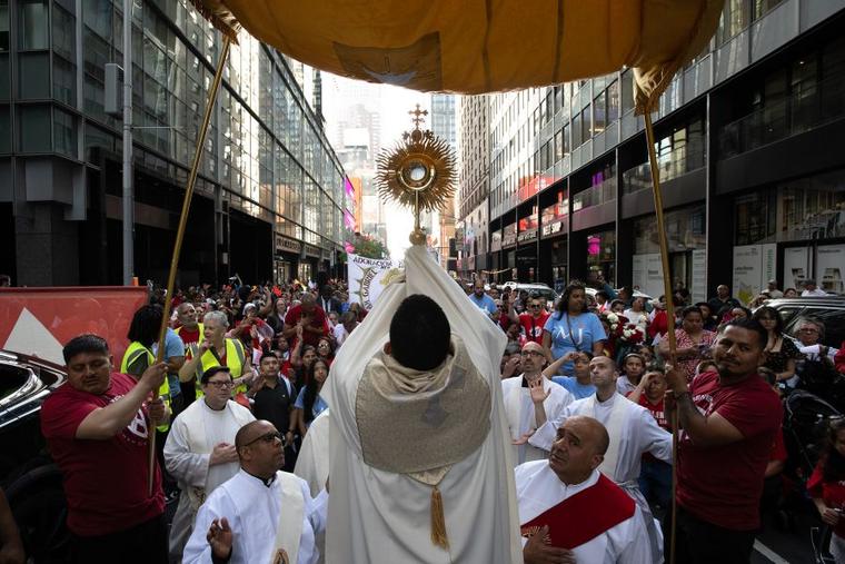 Philippine catholics swarm christ icon in feverish parade