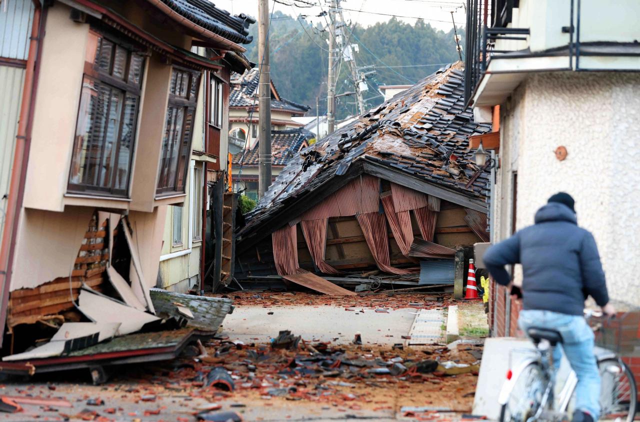 Helpless japan earthquake shatters new year calm