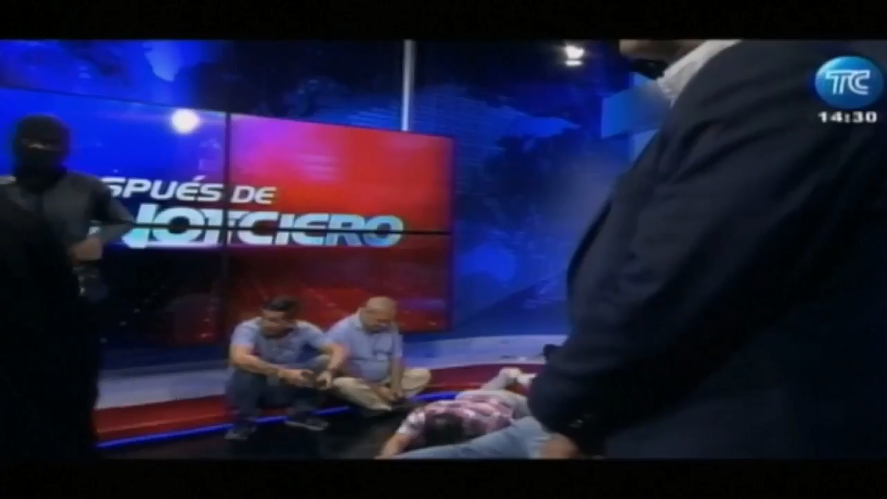 Ecuador s escalating gang violence is broadcast live as masked gunmen storm tv studio