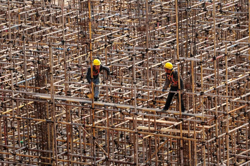China central bank cuts benchmark lending rate to boost economy