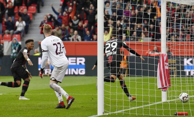 Tah strikes late to send leverkusen to german cup semis
