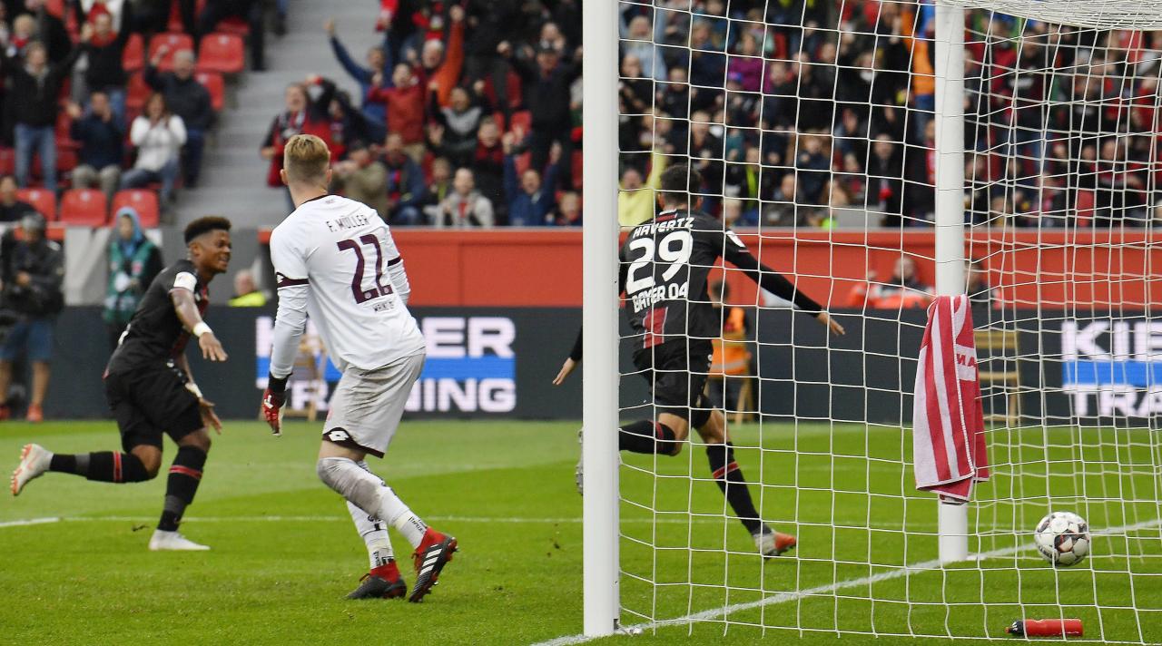 Tah strikes late to send leverkusen to german cup semis