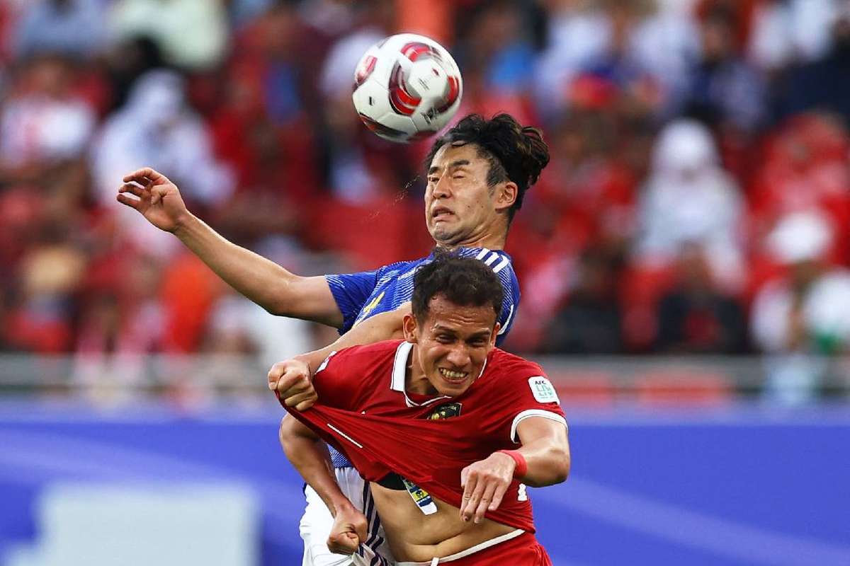 Japan cruise past indonesia to reach asian cup last 16