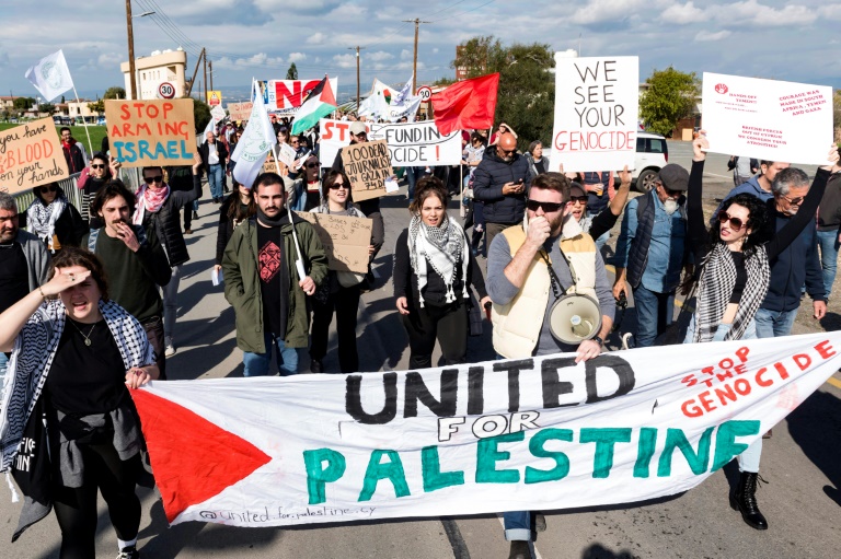 Hundreds of peace protesters rally outside british base in cyprus