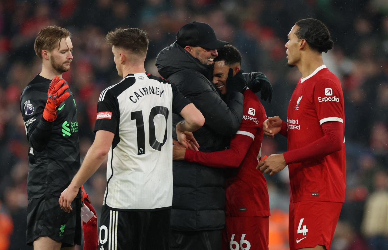 Liverpool survive fulham scare to book league cup final date with chelsea