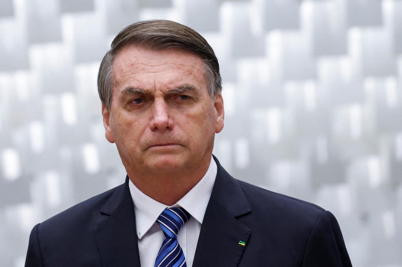 Brazil s ex president bolsonaro surrenders passport as police probe attempted coup