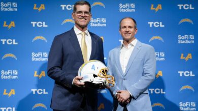 Chargers hire jim harbaugh after college triumph