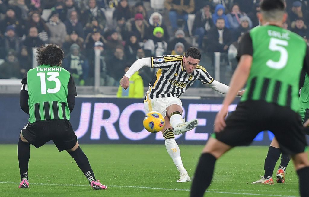 Vlahovic brace pushes juve two points behind leaders inter