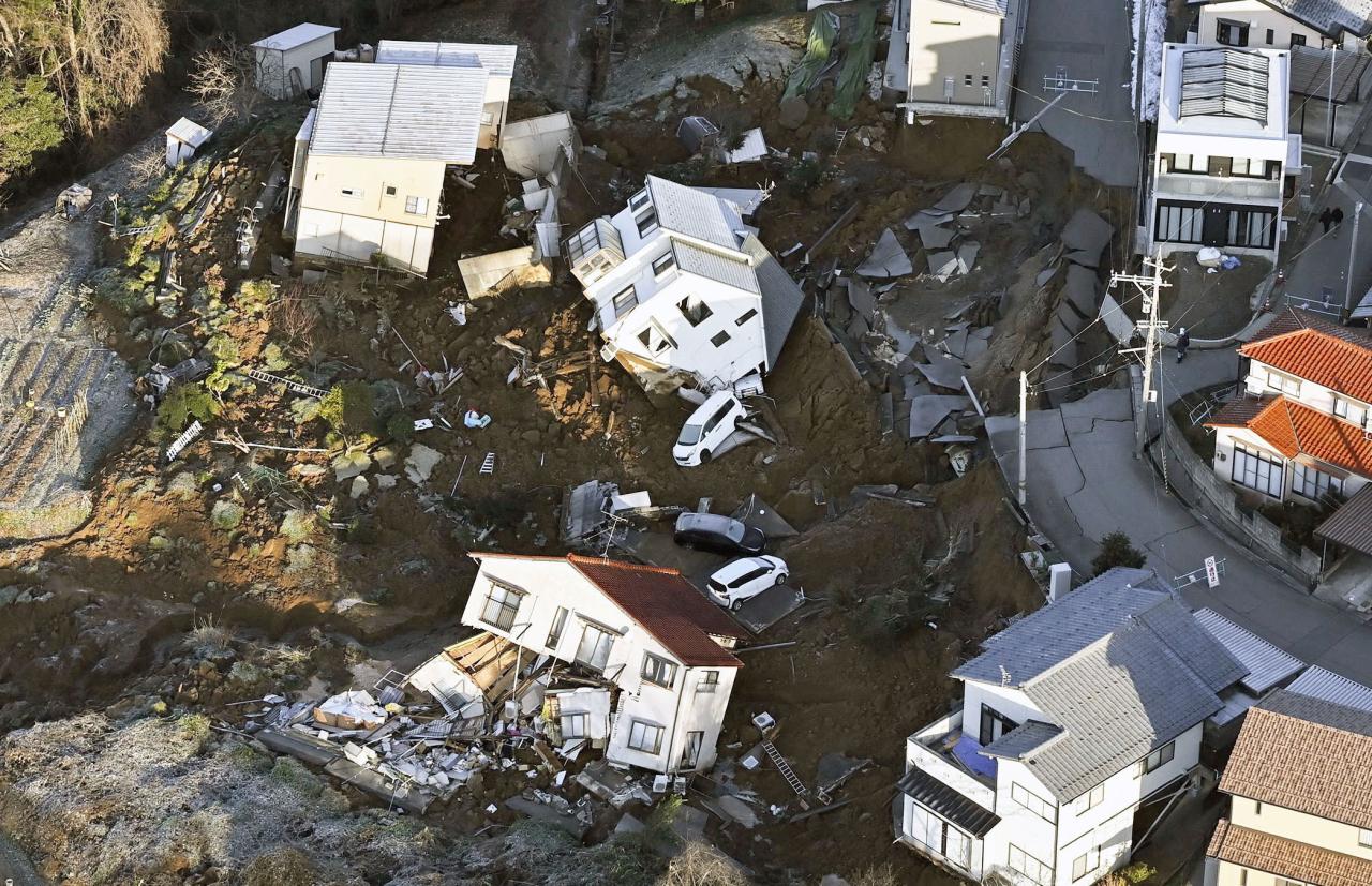 Japanese rescuers race to find survivors after earthquake kills dozens