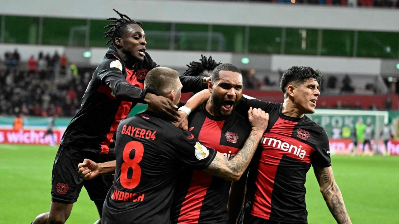 Tah strikes late to send leverkusen to german cup semis