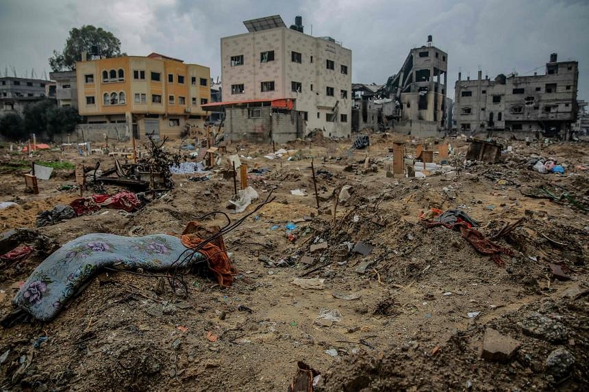 No rest for gaza dead with swift burials bodies dug up