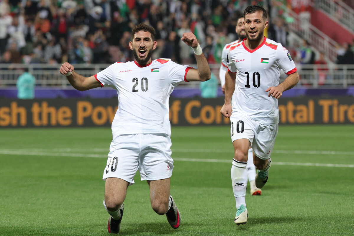 Qatar end palestine run jordan stun iraq with asian cup late show