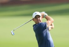 Mcilroy surges into two shot lead at dubai invitational