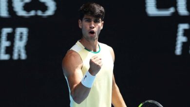 Alcaraz races into australian open last 16 after shang retires