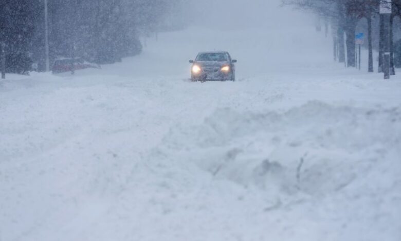 Storms wallop us with snow rain and tornadoes closing roads and schools