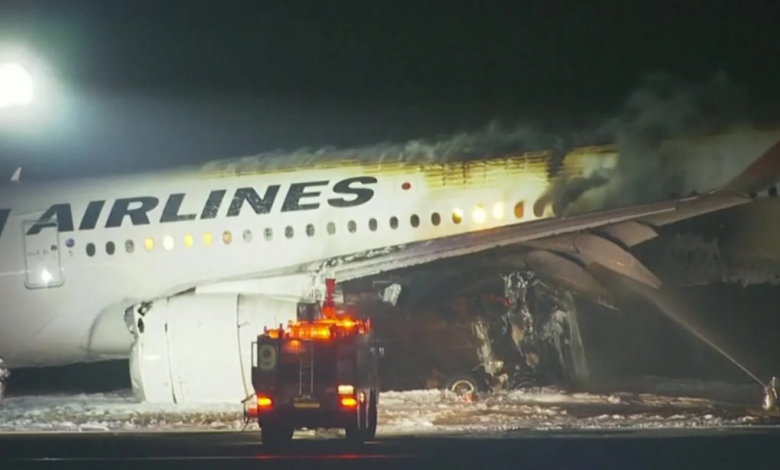 Japanese airliner burns after apparent collision with coast guard aircraft at tokyo s haneda airport