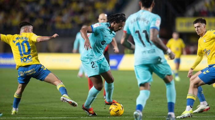 Late gundogan penalty snatches barca win at las palmas