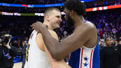 Jokic and nuggets hold off embiid less 76ers