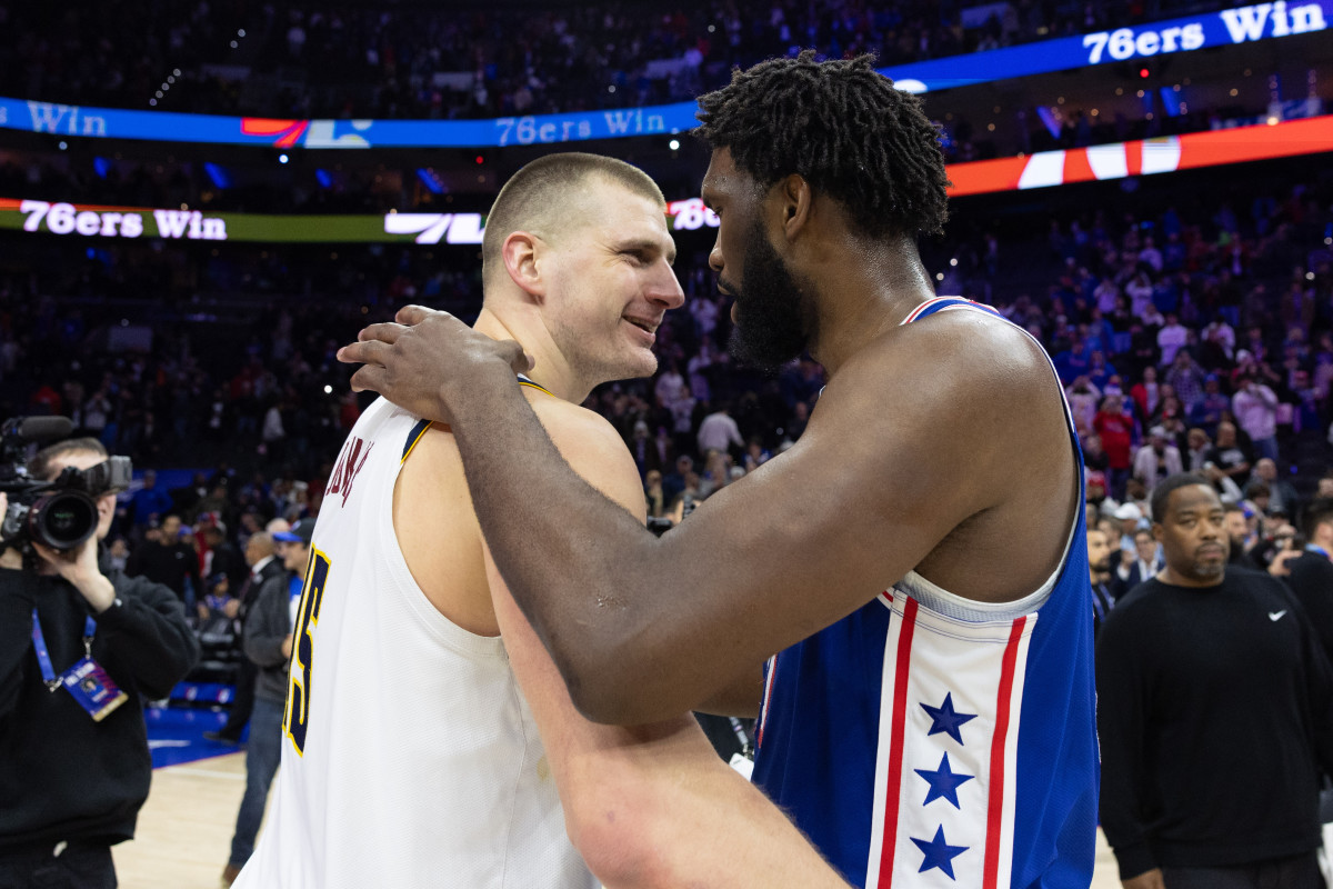 Jokic and nuggets hold off embiid less 76ers