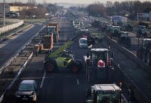 Defiant french farmers stick to barricades