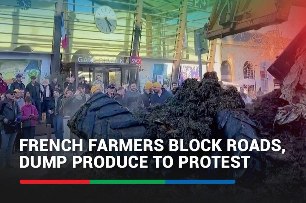 Defiant french farmers stick to barricades